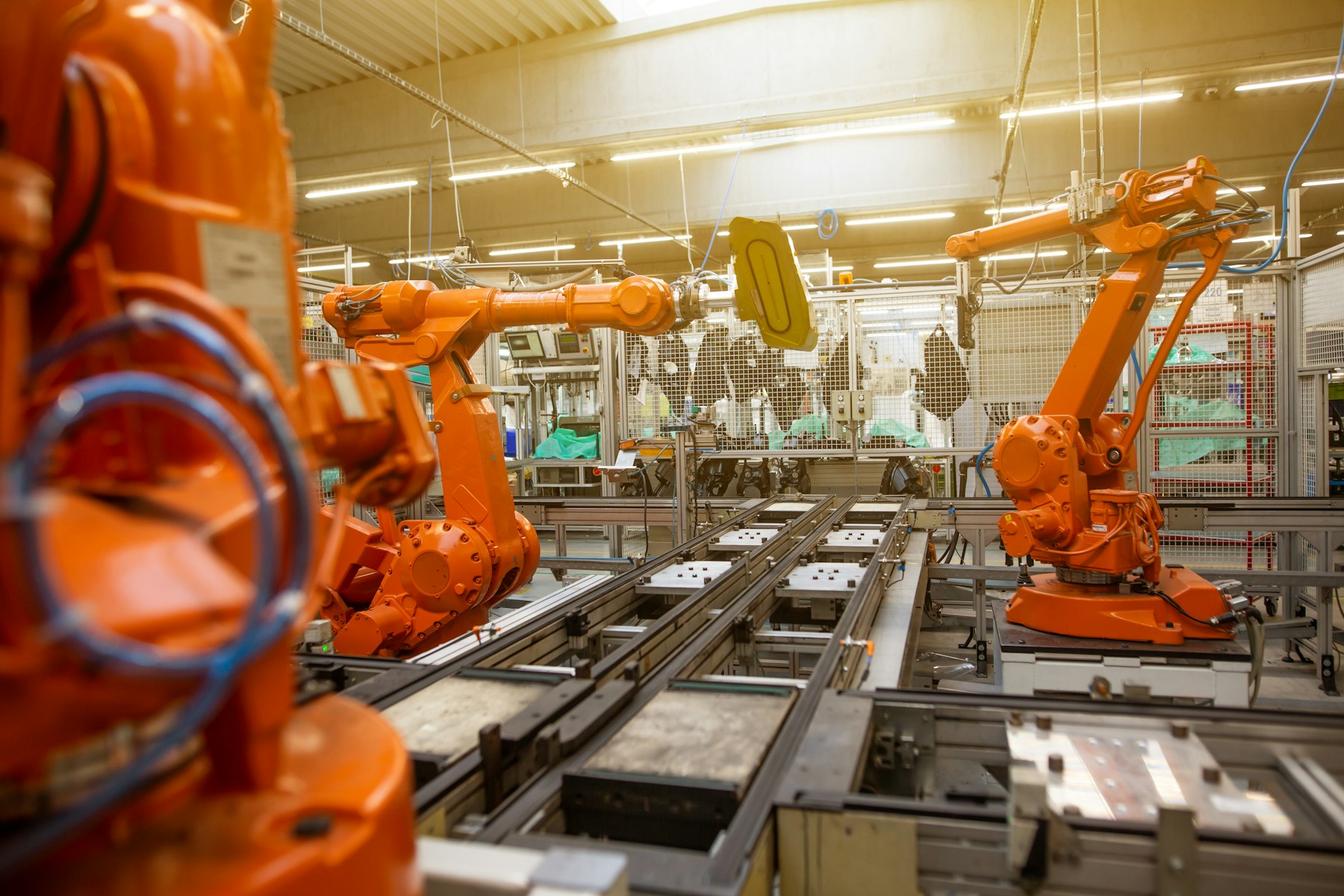 Automated production equipment inside a modern factory
